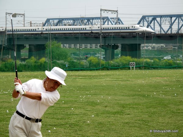 I don't think this guy can reach the train with a 7 iron
