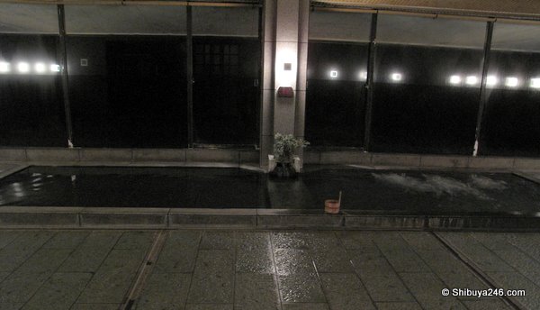 Main heated onsen style bath in the middle. Washing areas off to side (out of picture)