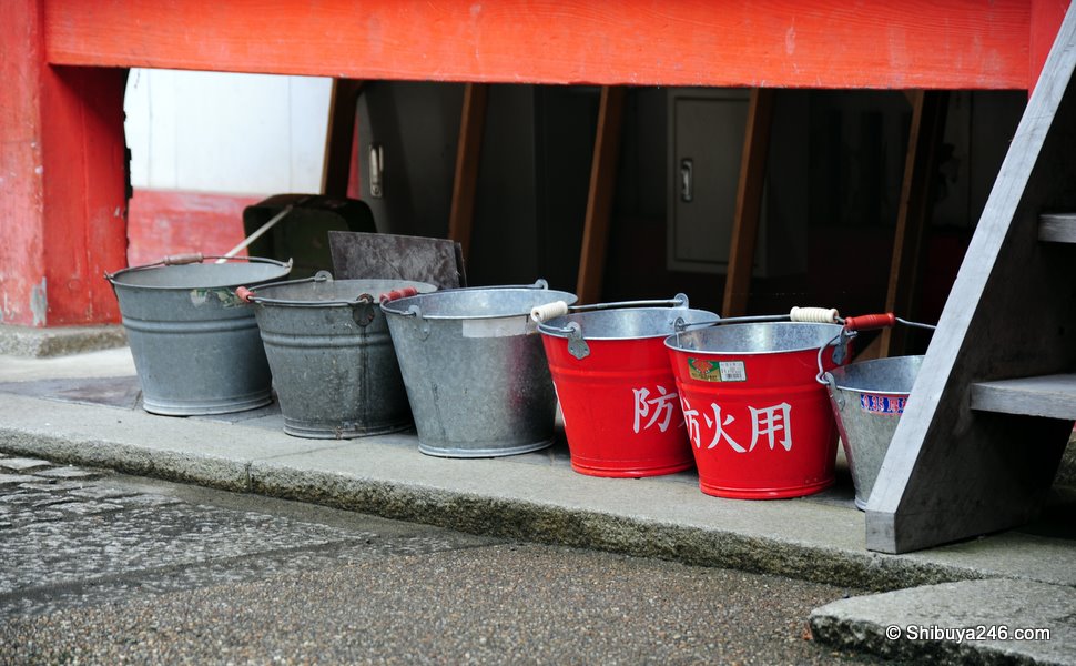 Bright red buckets in case of fire. I'm sure they have other ways of putting out fires as well as these buckets