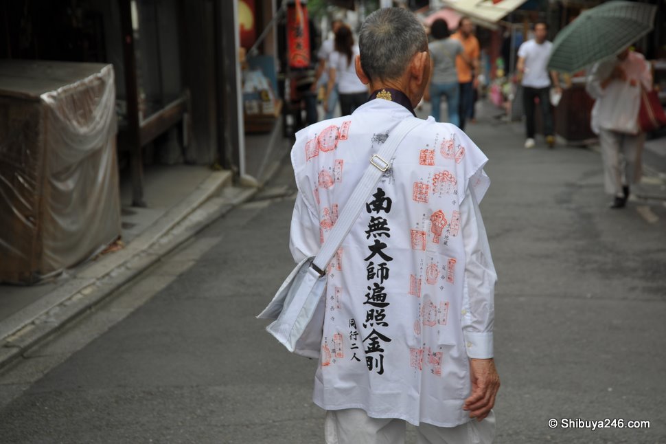 unsure of what this man represents, but he is giving it a good promotion