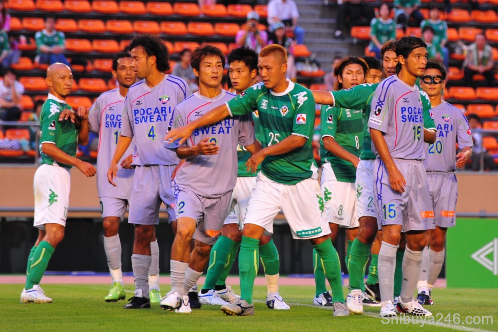 The free kick creates a chance, but there is some jostling for positions to be done first