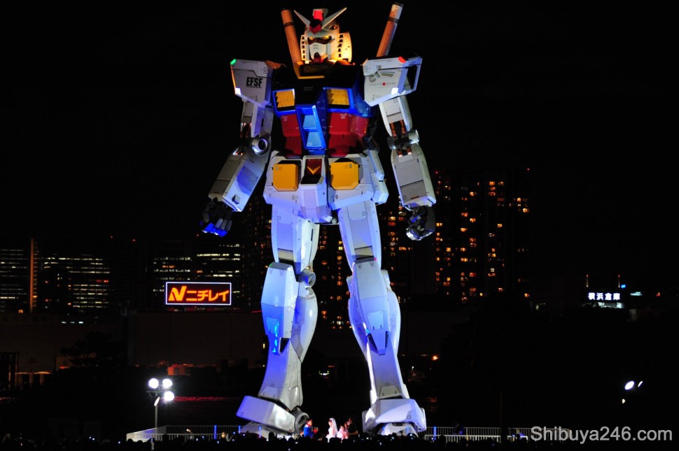 Gundam watches over the wedding taking place below him