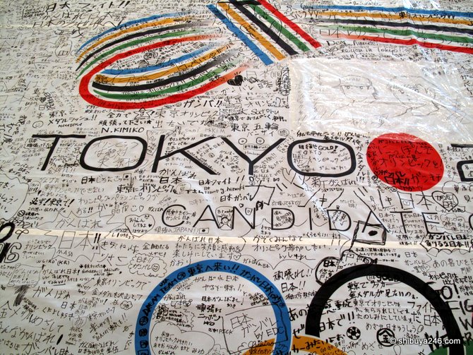 Supporters sign in for the Tokyo 2016 Olympics, Paralympics