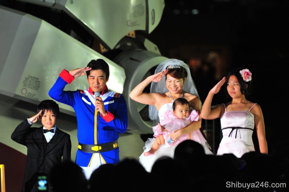 The wedding family salute to the crowd