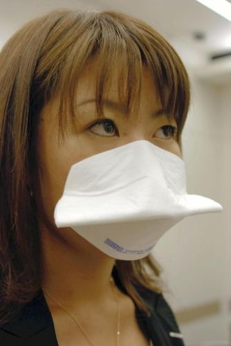 Face mask that sticks to your face. photo by Yomiuri Newspaper