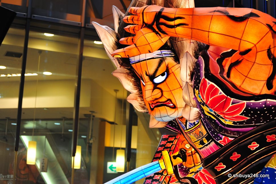 A nice look at the float at it goes past Tsutaya video store