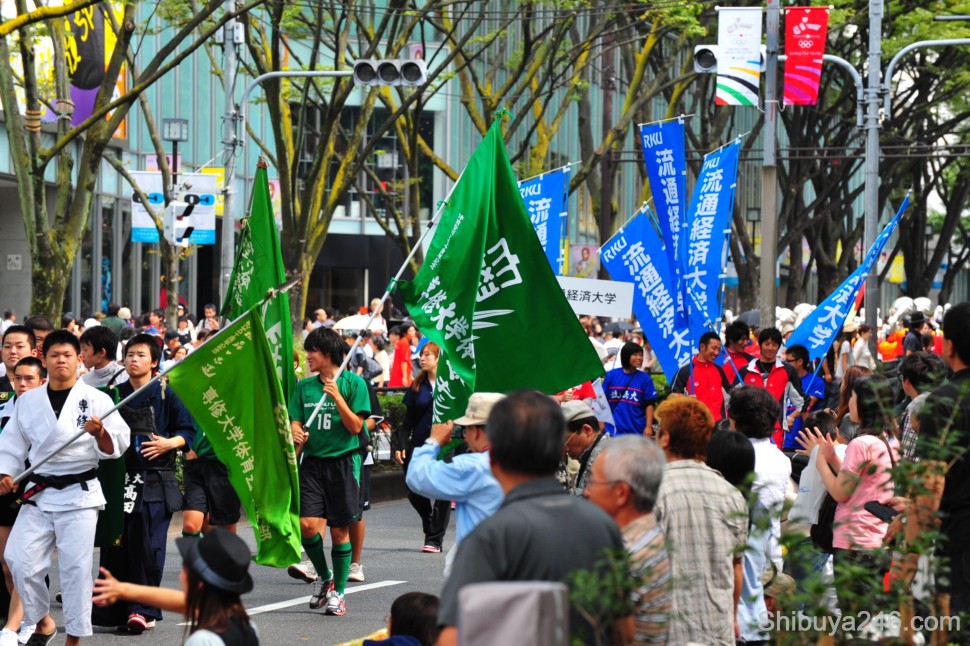 Plenty of flags and uniforms showing the University groups