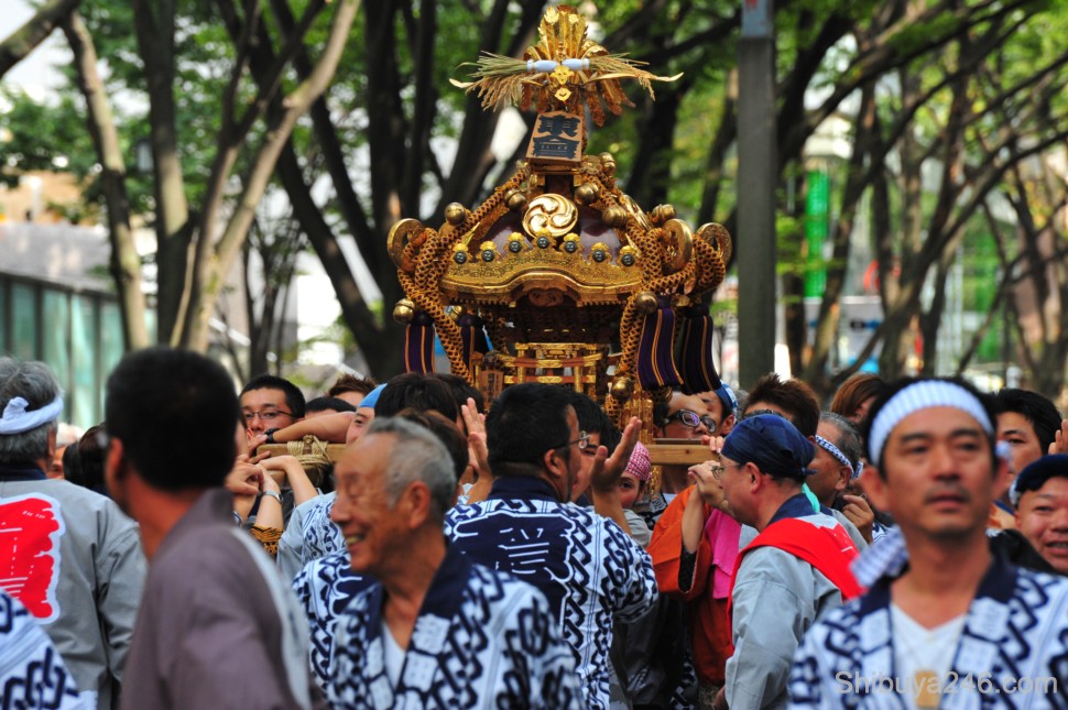 The mikoshi gets carried down the parade route