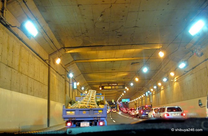 after some underground tunneling we finally hit the traffic jam at an exit ramp