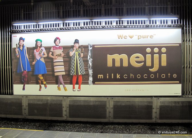 The Meiji Chocolate poster at the station