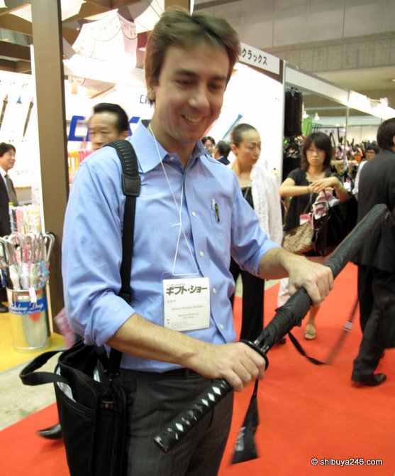 My friend decided to pick up an umbrella that looked like a Japanese sword, (Katana)