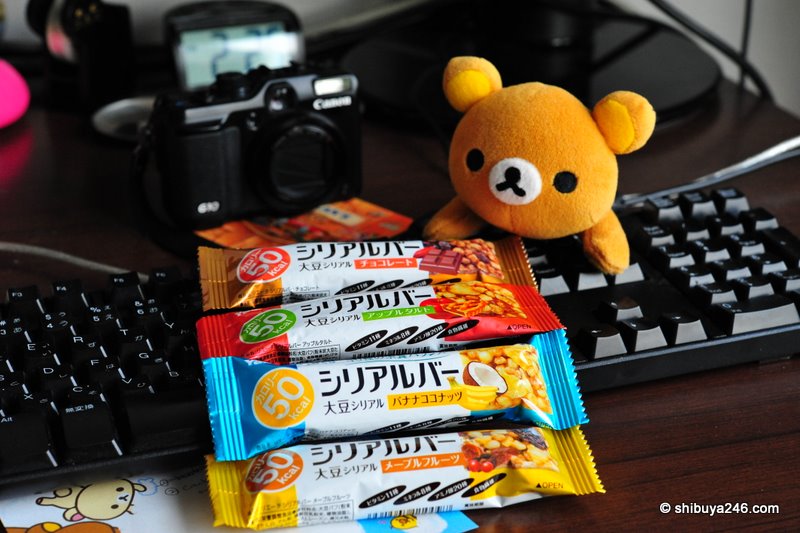 Rilakkuma checking out these tasty soybean cereal bars from Yakult