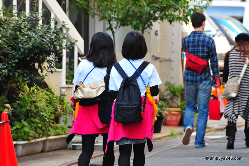 These 2 girls were wearing exactly the same outfit. Not sure what the outfit was for