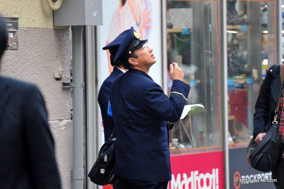 Patrolling Center-gai checking fire prepartions of stores