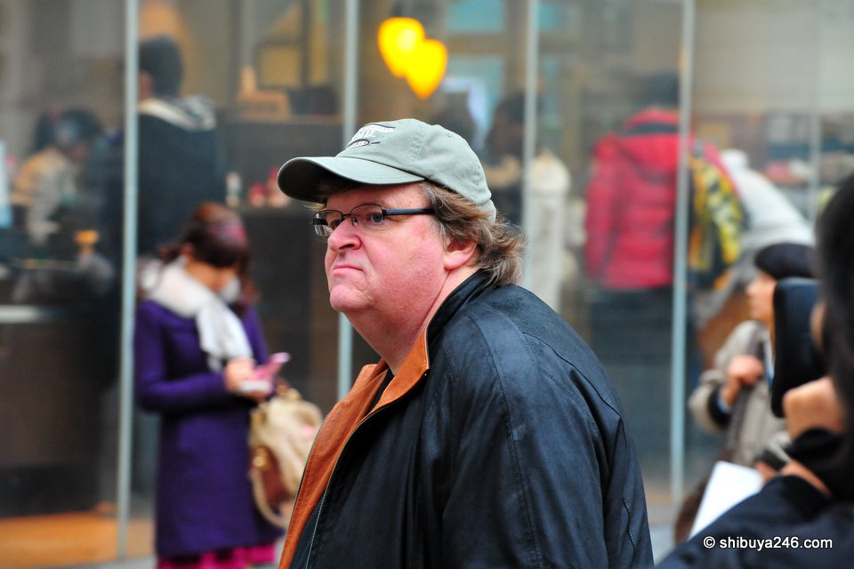 Michael Moore in Shibuya taking a look at the Center-gai