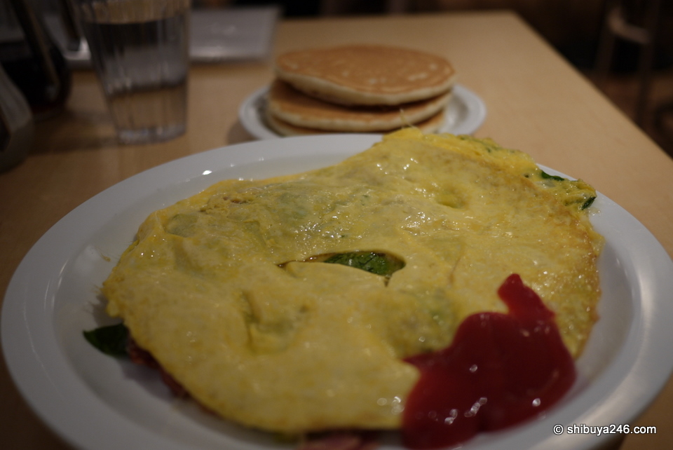 A spinach omlette at eggsnthings Harajuku, followed by a short stack of pancakes. Very tasty but a bit pricey.