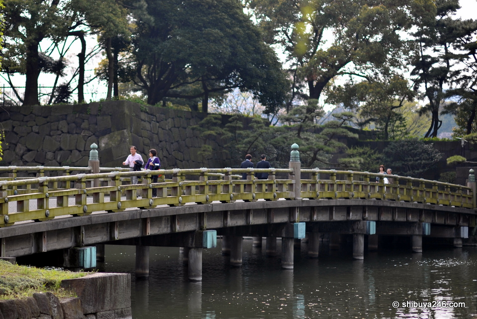 A beautiful old style bridge crossing the moat at the Imperial Palace.